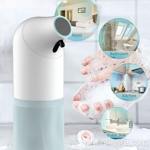 white hands free soap dispenser